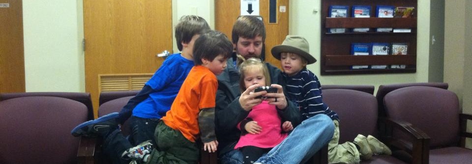 Kids watching iPhone games